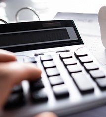 Patient in Columbus budgeting for teeth whitening