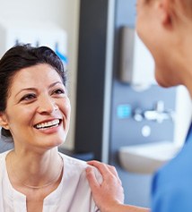 Patient in Columbus talking to dentist about teeth whitening