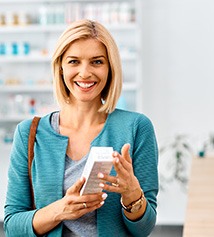 Patient in Columbus looking at OTC teeth whitening options