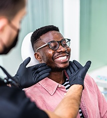 Man smiling at the dentist