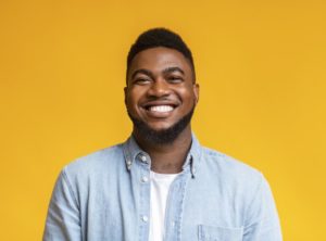 man smiling after getting cosmetic dentistry in Upper Arlington 