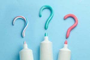 different types of toothpaste forming questions marks