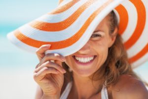 a woman with a beautiful smile during her summer vacation