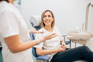 Patient talking to a dentist